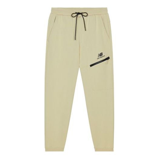 Спортни панталони New Balance Print Sweatpants Бежово | AMP13356-BEI