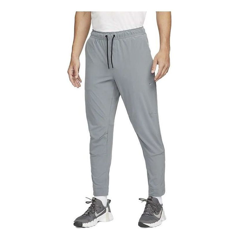 Спортни панталони Nike Zippered Cuff Versatile Training Pants Сиво | FB7549-084