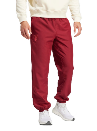 Спортни панталони adidas Originals Manchester United Lifestyler Woven Червено | IT9047