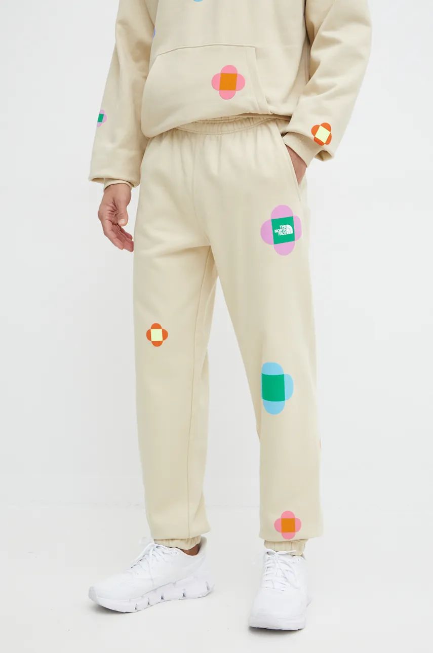 Спортни панталони The North Face Yinka Ilori x Floral Print Sweatpants Бежово | NF0A8AQ23X41, 0