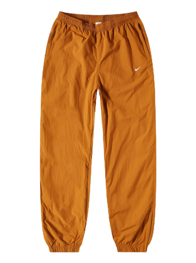 Спортни панталони Nike NRG Woven Track Pant Оранжево
 | DQ6571-754