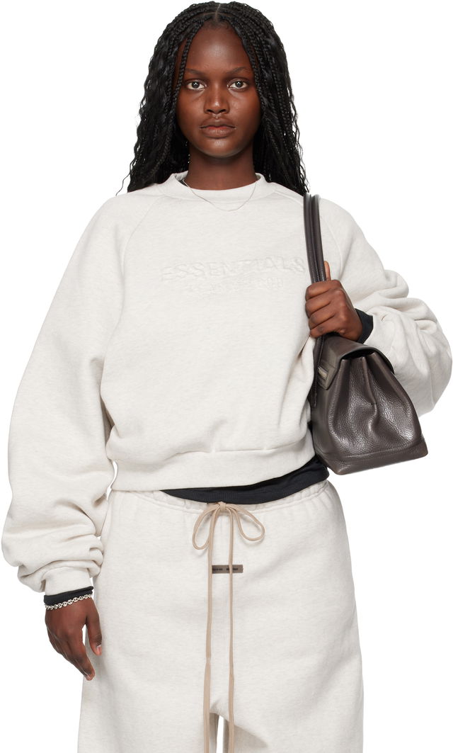 Fear of God ESSENTIALS Holiday Embossed 90s Raglan Crewneck Sweatshirt