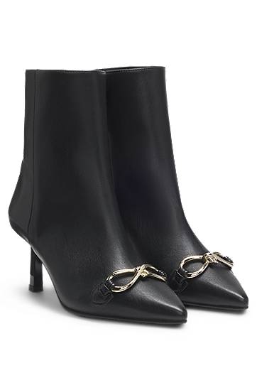 Faux-leather boots with hardware trim and 7cm heel