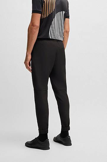 Спортни панталони BOSS Water-Repellent Tapered Stretch Trousers Черно | 50534313, 1