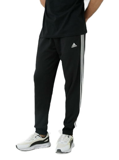 Спортни панталони adidas Performance Essentials French Terry Tapered Cuff 3-Stripes Черно | HA4337