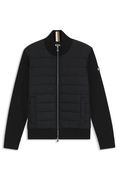 Mixed-material jacket with padded front and knitted sleeves