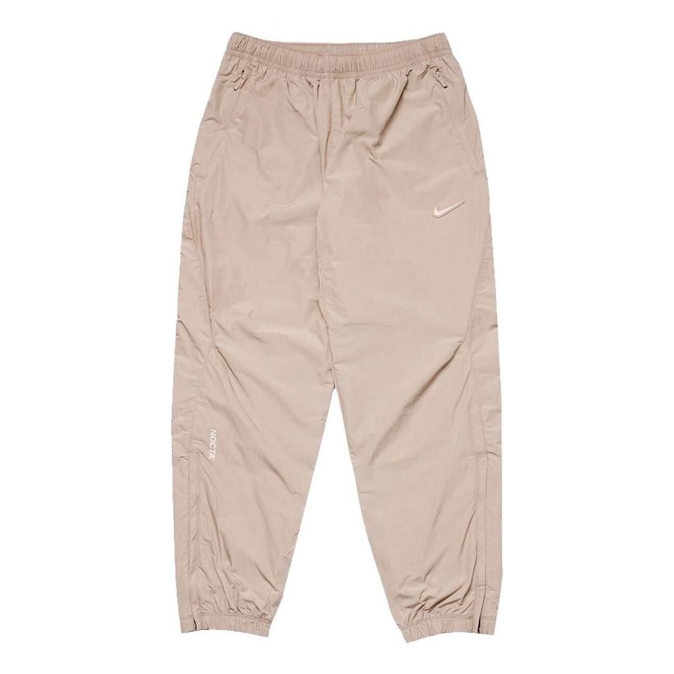 Спортни панталони Nike Drake NOCTA Nylon Track Pants Бежово | FN7669-200, 0