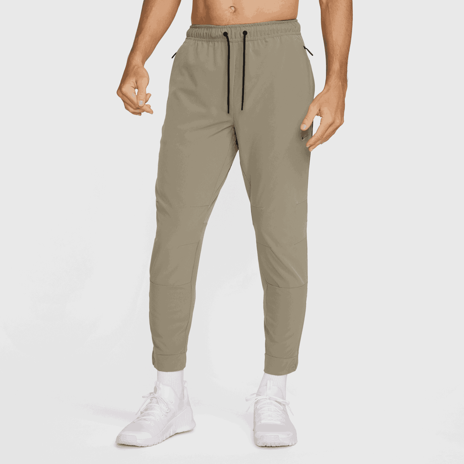 Спортни панталони Nike Dri-FIT Unlimited Versatile Zip-Cuff Pants Зелено | FB7548-320, 1