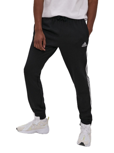 Панталони и дънки adidas Performance Essentials French Terry Tapered Cuff 3 Stripes Черно | GK8821