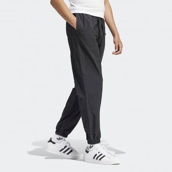 Панталони adidas Originals Ess Pants Wv Сиво | IS1796