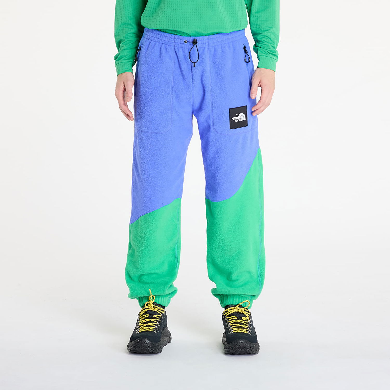 Спортни панталони The North Face Yinka Ilori x Fleece Pant Solar Blue/ Optic Emerald Зелено | NF0A89GG0IG1, 0