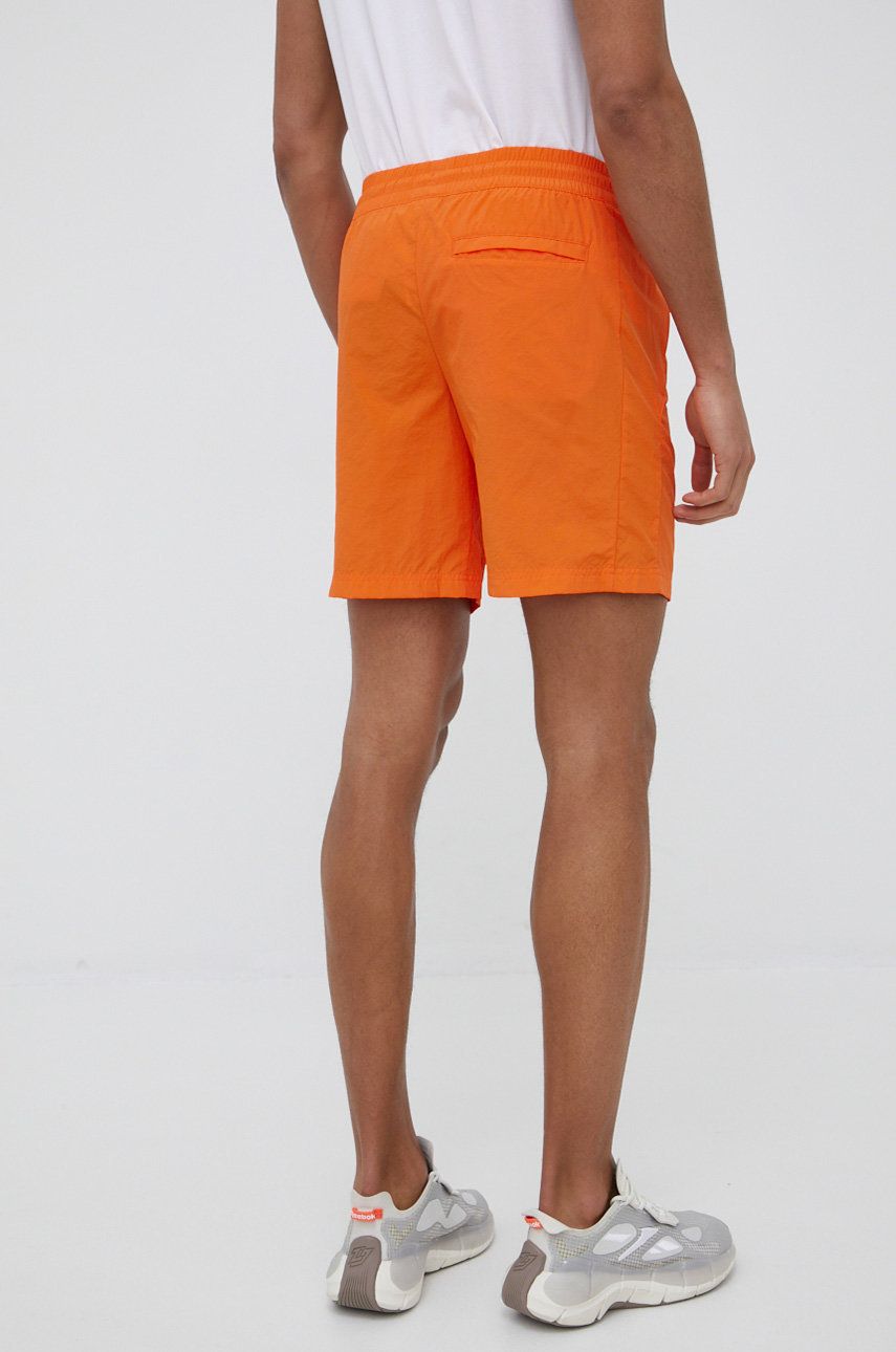 Къси панталони New Balance Athletics Amplified Woven Shorts Оранжево
 | MS21500POP, 1