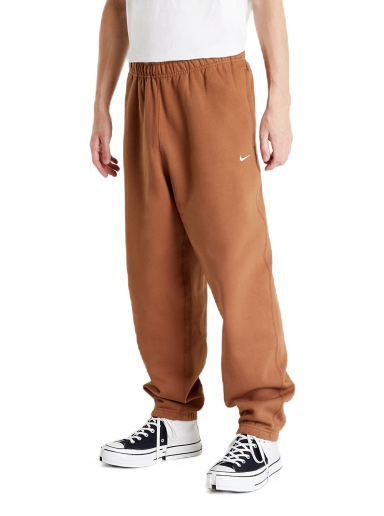 Спортни панталони Nike Solo Swoosh Fleece Кафяво | CW5460-270