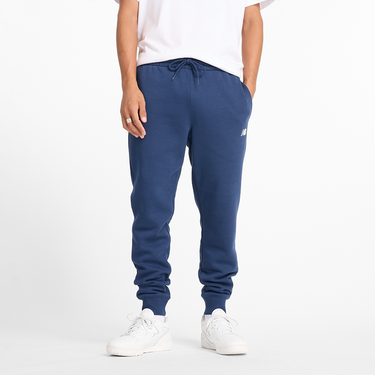 Спортни панталони New Balance NB Sweatpants Синьо | Pánske nohavice New Balance MP43904NNY – modré, 1