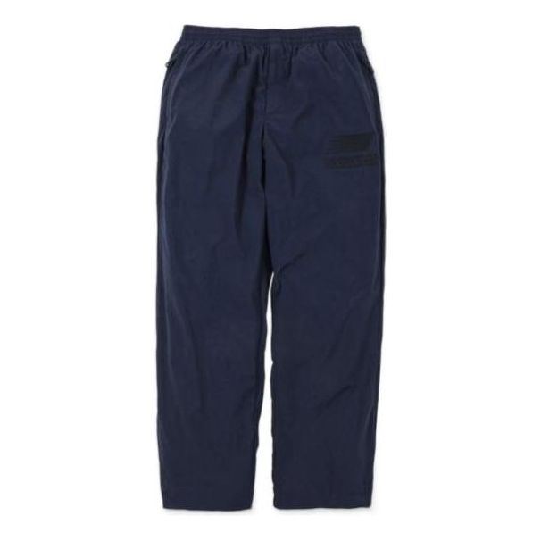 Спортни панталони New Balance N.HOOLYWOOD x INVINCIBLE(R) Woven Pants Синьо | AMP22346-PCT, 0
