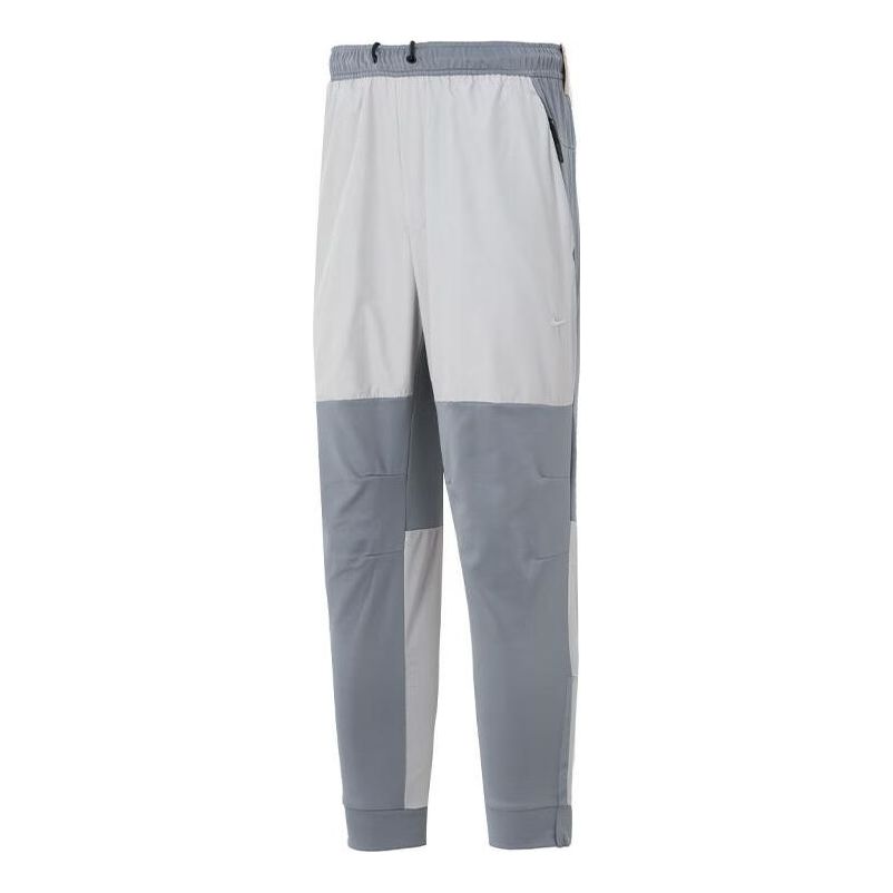 Панталони Nike Unlimited Water-Repellent Zippered Cuff Pants Сиво | FB8602-084, 0