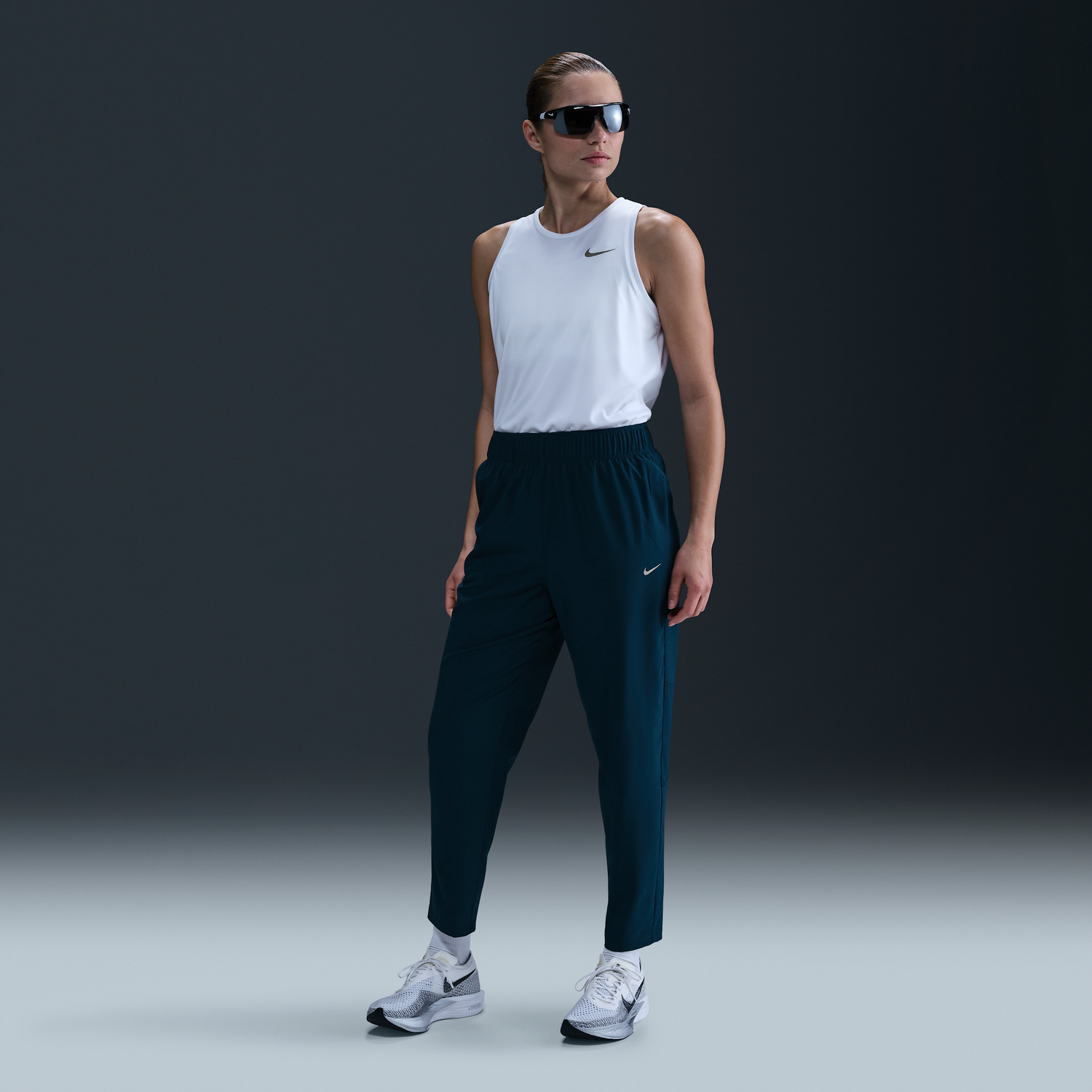 Панталони Nike Dri-FIT Fast 7/8 Running Pants with Mid-Rise Waist Тъмно синьо | FB7029-478, 1
