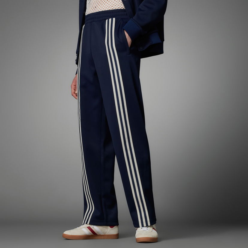 Спортни панталони adidas Performance Tracksuit Bottoms with Side Stripes Черно | IP6979